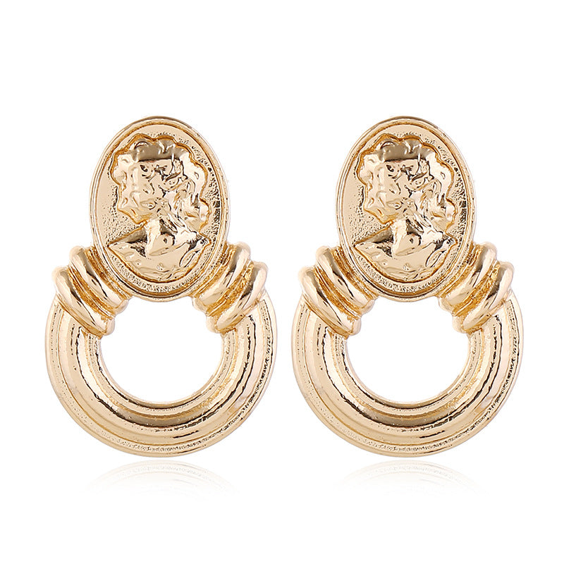 Gold Tone Embossed Silhouette Earrings