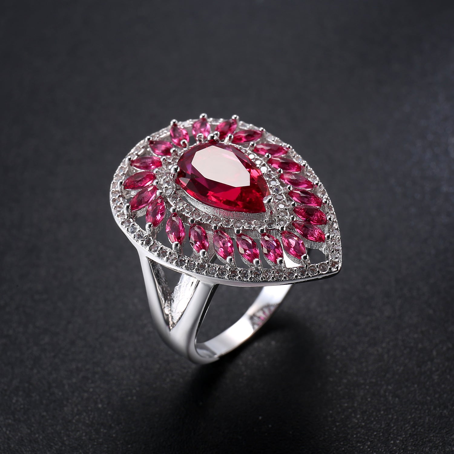 Cushioned Ruby Teardrop Domineering Ring